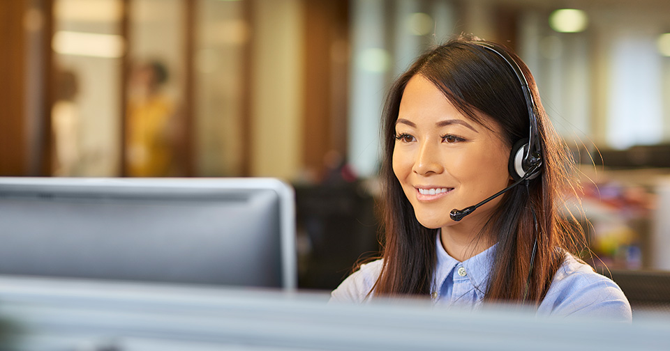 Customer service woman using computer